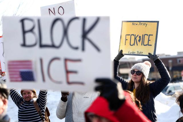 People protest against the planned project of converting a warehouse into a US Immigration and Customs Enforcement (ICE) detention center in Roxbury, New Jersey, on February 16, 2026. Activists say the Department of Homeland Security is considering converting this industrial warehouse into an ICE detention center which faces the opposition of the local community. (Photo by CHARLY TRIBALLEAU / AFP)