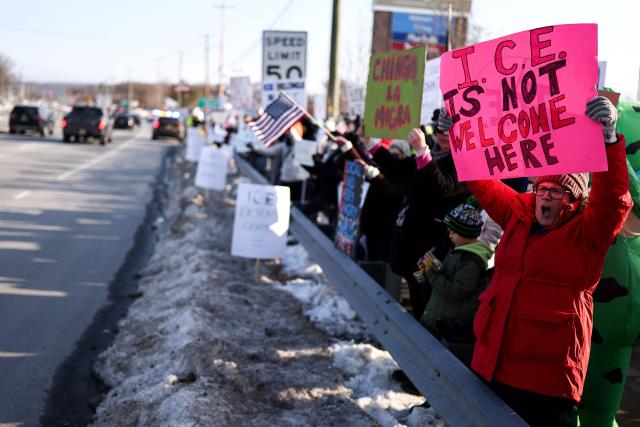 People protest against the planned project of converting a warehouse into a US Immigration and Customs Enforcement (ICE) detention center in Roxbury, New Jersey, on February 16, 2026. Activists say the Department of Homeland Security is considering converting this industrial warehouse into an ICE detention center which faces the opposition of the local community. (Photo by CHARLY TRIBALLEAU / AFP)