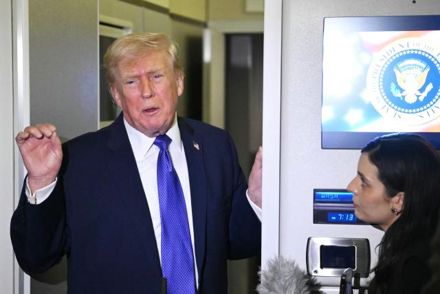 US President Donald Trump speaks to reporters while in flight on Air Force One, en route Joint Base Andrews from West Palm Beach, Florida on February 16, 2026. (Photo by Mandel NGAN / AFP)