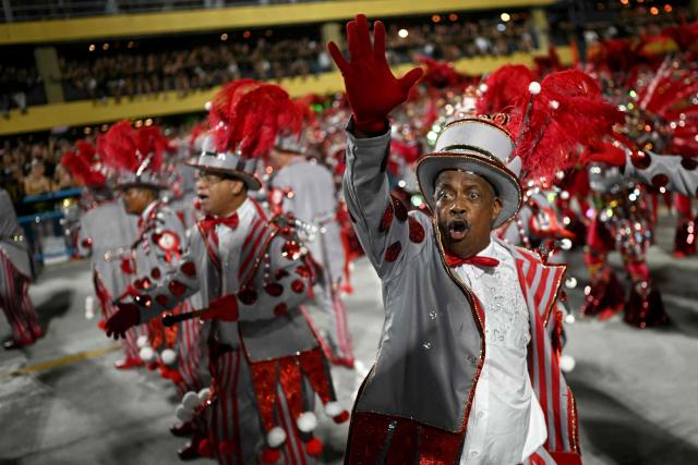 Revellers of the Unidos do Viradouro samba school perform during the second night of the Rio Carnival at the Marques de Sapucai Sambadrome in Rio de Janeiro, Brazil, early on February 17, 2026. (Photo by Mauro PIMENTEL / AFP)