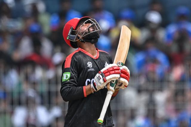 Canada's Yuvraj Samra celebrates after scoring a half-century (50 runs) during the 2026 ICC Men's T20 Cricket World Cup group stage match between Canada and New Zealand at the MA Chidambaram Stadium in Chennai on February 17, 2026. (Photo by R. Satish BABU / AFP)
