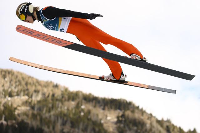 Finland's Wille Karhumaa jumps in the trial round of the ski jumping event of the nordic combined individual Gundersen large hill/10km at Predazzo Ski Jumping Stadium in Predazzo (Val di Fiemme) during the Milano Cortina 2026 Winter Olympic Games on February 17, 2026. (Photo by Anne-Christine POUJOULAT / AFP)