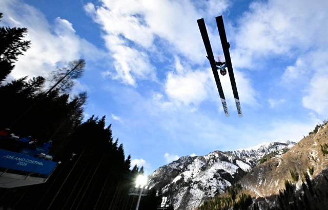 Ukraine's Dmytro Mazurchuk jumps in the trial round of the ski jumping event of the nordic combined individual Gundersen large hill/10km at Predazzo Ski Jumping Stadium in Predazzo (Val di Fiemme) during the Milano Cortina 2026 Winter Olympic Games on February 17, 2026. (Photo by Tobias SCHWARZ / AFP)