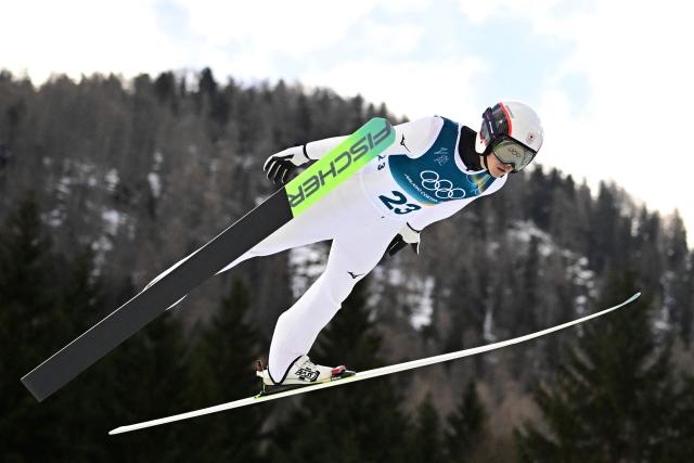 Japan's Ryota Yamamoto competes in the ski jumping event of the nordic combined individual Gundersen large hill/10km at Predazzo Ski Jumping Stadium in Predazzo (Val di Fiemme) during the Milano Cortina 2026 Winter Olympic Games on February 17, 2026. (Photo by Tobias SCHWARZ / AFP)