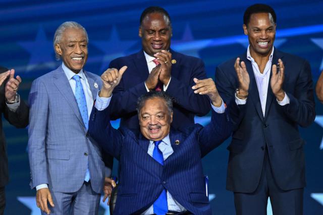 (FILES) US civil rights activist Jesse Jackson is honored onstage during the first day of the Democratic National Convention (DNC) at the United Center in Chicago, Illinois, on August 19, 2024. American Black pastor and civil rights activist Jesse Jackson has died, his family announced on February 17, 2026. (Photo by Mandel NGAN / AFP)