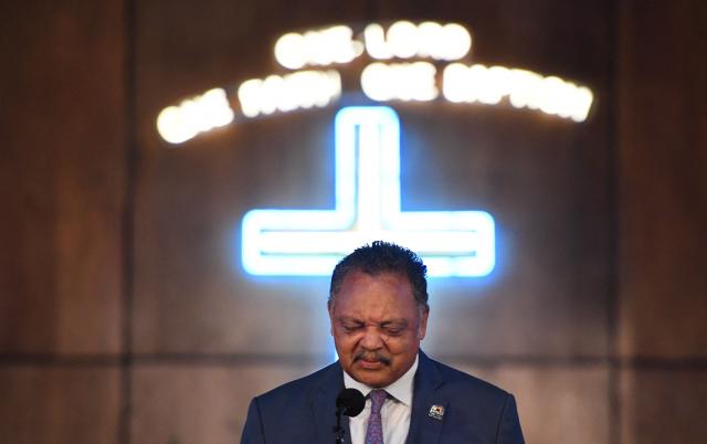 (FILES) The Rev. Jesse Jackson speaks celebrating the life of singer Aretha Franklin at her father's  church , New Bethel Baptist, during a Sunday morning service in Detroit, Michigan on August 19, 2018. Veteran US civil rights activist Reverend Jesse Jackson died on February 17, 2026, his family said in a statement. He was 84. (Photo by TIMOTHY A. CLARY / AFP)