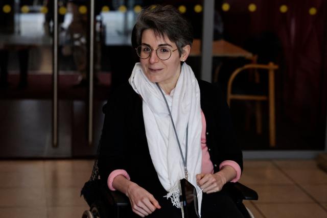 Philosopher Anne-Lyse Chabert attends a meeting on euthanasia organised by the association "Les Eligibles et leurs Aidants" as French National Assembly debates on the assisted dying bill at the 'Centre d'etude, de documentation, d'information et d'action sociale' CEDIAS in Paris on February 17, 2026. (Photo by STEPHANE DE SAKUTIN / AFP)