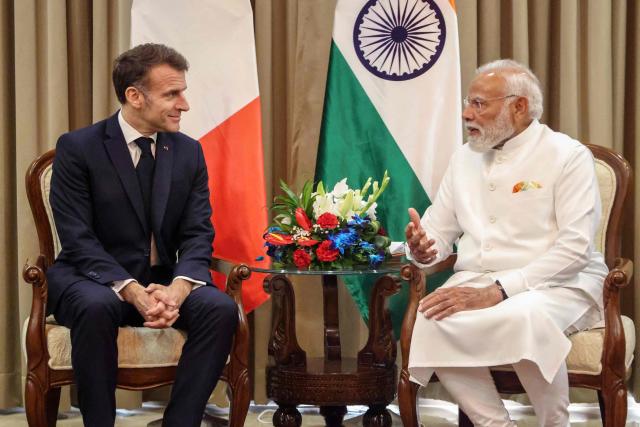 France's President Emmanuel Macron (L) and India's Prime Minister Narendra Modi take part in a bilateral meeting in Mumbai on February 17, 2026. (Photo by Ludovic MARIN / POOL / AFP)