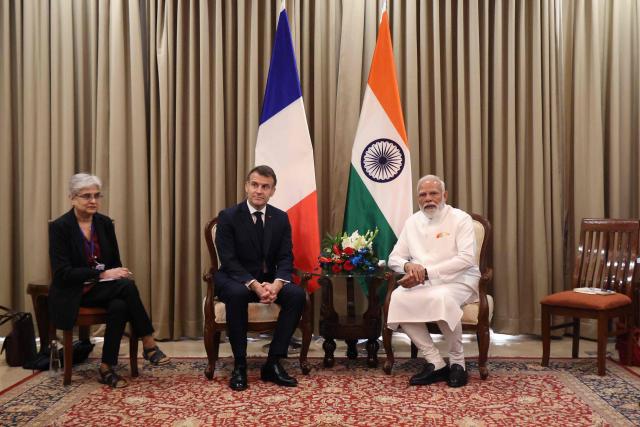 France's President Emmanuel Macron (2nd L) and India's Prime Minister Narendra Modi (R) take part in a bilateral meeting in Mumbai on February 17, 2026. (Photo by Ludovic MARIN / POOL / AFP)
