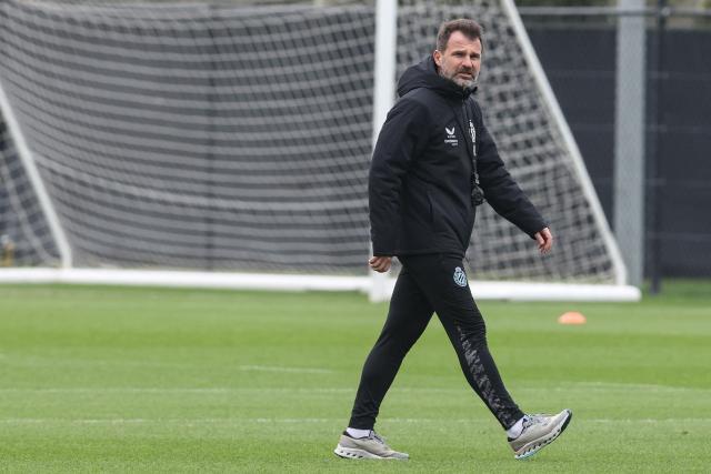 Club Brugge's Croatian coach Ivan Leko walks during a training session on the eve of the UEFA Champions League knockout round play-off first leg football match against Atletico Madrid in Knokke-Heist on February 17, 2026. (Photo by BRUNO FAHY / Belga / AFP) / Belgium OUT