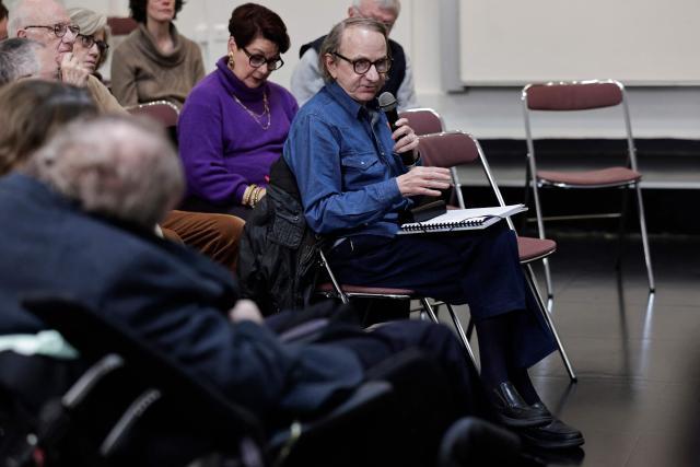French writer Michel Houellebecq speaks as he attends a meeting on euthanasia organised by the association "Les Eligibles et leurs Aidants" as French National Assembly debates on the assisted dying bill at the 'Centre d'etude, de documentation, d'information et d'action sociale' CEDIAS in Paris on February 17, 2026. (Photo by STEPHANE DE SAKUTIN / AFP)