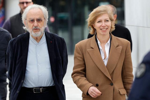 Special adviser to the president of the Arab World Institute Claude Mollard (L) and newly appointed head of the Arab World Institute (IMA), Anne-Claire Legendre arrive to speak to the press at the Institut du Monde Arabe (IMA - Arab World Institute) in Paris on February 17, 2026. Appointed on February 17, 2026 to succeed Jack Lang as head of the Arab World Institute (IMA), Anne-Claire Legendre is a seasoned diplomat whose expertise on the Maghreb and the Middle East is unanimously praised for serving as a prestigious instrument of French influence. (Photo by GEOFFROY VAN DER HASSELT / AFP)
