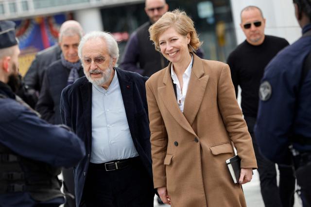 Special adviser to the president of the Arab World Institute Claude Mollard (L) and newly appointed head of the Arab World Institute (IMA), Anne-Claire Legendre arrive to speak to the press at the Institut du Monde Arabe (IMA - Arab World Institute) in Paris on February 17, 2026. Appointed on February 17, 2026 to succeed Jack Lang as head of the Arab World Institute (IMA), Anne-Claire Legendre is a seasoned diplomat whose expertise on the Maghreb and the Middle East is unanimously praised for serving as a prestigious instrument of French influence. (Photo by GEOFFROY VAN DER HASSELT / AFP)
