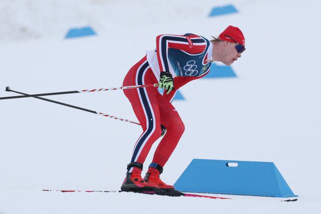 Norway's Andreas Skoglund competes in the cross-country event of the nordic combined individual Gundersen large hill/10km at Tesero Cross Country Stadium at Lago di Tesero (Val di Fiemme) during the Milano Cortina 2026 Winter Olympic Games on February 17, 2026. (Photo by Anne-Christine POUJOULAT / AFP)