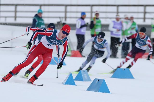 Norway's Andreas Skoglund competes in the cross-country event of the nordic combined individual Gundersen large hill/10km at Tesero Cross Country Stadium at Lago di Tesero (Val di Fiemme) during the Milano Cortina 2026 Winter Olympic Games on February 17, 2026. (Photo by Anne-Christine POUJOULAT / AFP)