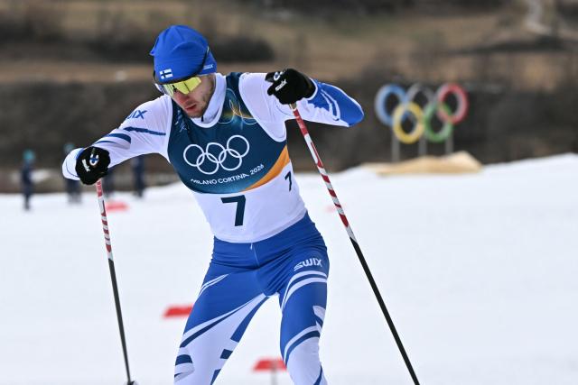 Finland's Ilkka Herola competes in the cross-country event of the nordic combined individual Gundersen large hill/10km at Tesero Cross Country Stadium at Lago di Tesero (Val di Fiemme) during the Milano Cortina 2026 Winter Olympic Games on February 17, 2026. (Photo by Javier SORIANO / AFP)
