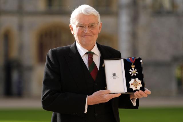 Britain's former Shadow Foreign Secretary Andrew Mitchell poses with their medal and insignia after being appointed as a Knight Commander of the Order of St Michael and St George (KCMG) at an investiture ceremony at Windsor Castle, in Windsor on February 17, 2026. (Photo by Andrew Matthews / POOL / AFP)