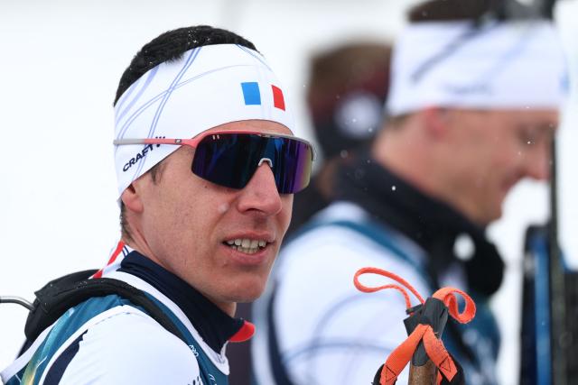 France's Quentin Fillon Maillet reacts during warm-up prior to the men's biathlon 4 x 7,5km relay event during the Milano Cortina 2026 Winter Olympic Games at the Anterselva Biathlon Arena (Sudtirol Arena) in Anterselva (Val Pusteria) on February 17, 2026. (Photo by FRANCK FIFE / AFP)