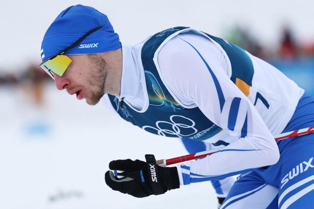 Finland's Ilkka Herola competes in the cross-country event of the nordic combined individual Gundersen large hill/10km at Tesero Cross Country Stadium at Lago di Tesero (Val di Fiemme) during the Milano Cortina 2026 Winter Olympic Games on February 17, 2026. (Photo by Anne-Christine POUJOULAT / AFP)