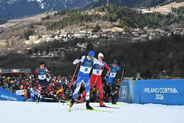 (From L) Austria's Thomas Rettenegger, Finland's Eero Hirvonen, Norway's Einar Luraas Oftebro and Estonia's Kristjan Ilves compete in the cross-country event of the nordic combined individual Gundersen large hill/10km at Tesero Cross Country Stadium at Lago di Tesero (Val di Fiemme) during the Milano Cortina 2026 Winter Olympic Games on February 17, 2026. (Photo by Javier SORIANO / AFP)