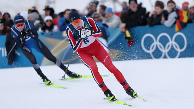 Norway's Jens Luraas Oftebro competes in the cross-country event of the nordic combined individual Gundersen large hill/10km at Tesero Cross Country Stadium at Lago di Tesero (Val di Fiemme) during the Milano Cortina 2026 Winter Olympic Games on February 17, 2026. (Photo by Anne-Christine POUJOULAT / AFP)