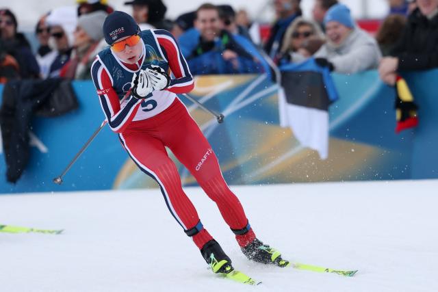 Norway's Jens Luraas Oftebro competes in the cross-country event of the nordic combined individual Gundersen large hill/10km at Tesero Cross Country Stadium at Lago di Tesero (Val di Fiemme) during the Milano Cortina 2026 Winter Olympic Games on February 17, 2026. (Photo by Anne-Christine POUJOULAT / AFP)