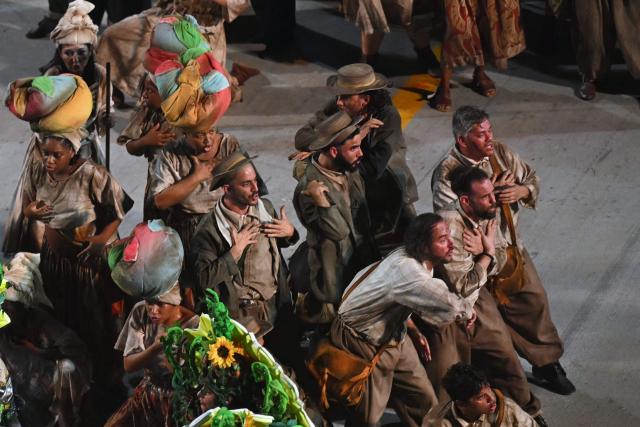 Revellers of the Unidos da Tijuca samba school perform during the second night of the Rio Carnival at the Marques de Sapucai Sambadrome in Rio de Janeiro, Brazil, early on February 17, 2026. (Photo by Mauro PIMENTEL / AFP)