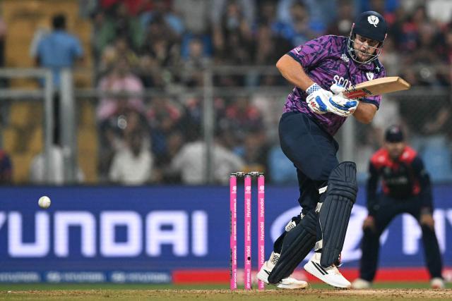 Scotland's George Munsey watches the ball after playing a shot during the 2026 ICC Men's T20 Cricket World Cup group stage match between Nepal and Scotland at the Wankhede Stadium in Mumbai on February 17, 2026. (Photo by Punit PARANJPE / AFP)