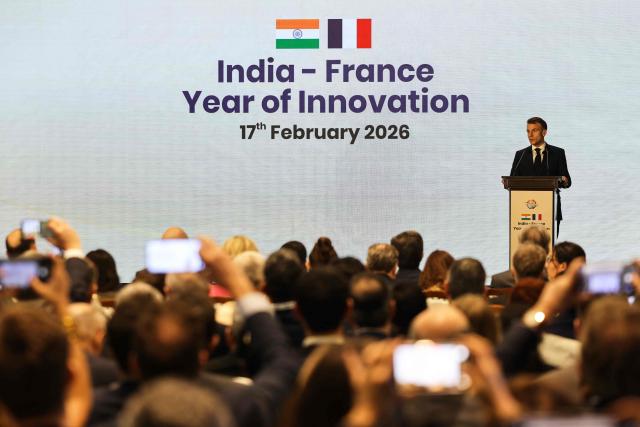 France's President Emmanuel Macron addresses the launch of the India-France Year of Innovation at the Taj Mahal Palace Hotel in Mumbai on February 17, 2026. (Photo by Ludovic MARIN / AFP)