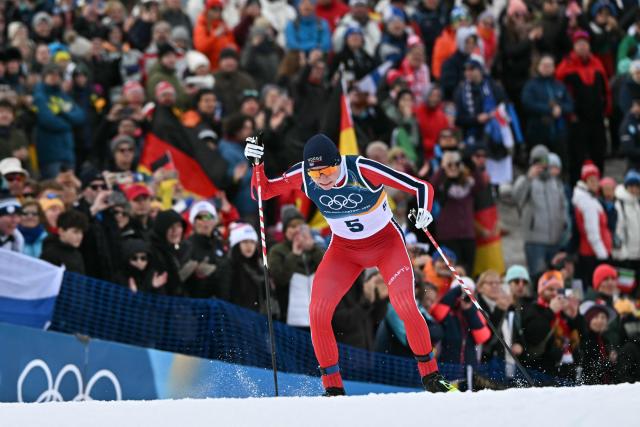 Norway's Jens Luraas Oftebro competes in the cross-country event of the nordic combined individual Gundersen large hill/10km at Tesero Cross Country Stadium at Lago di Tesero (Val di Fiemme) during the Milano Cortina 2026 Winter Olympic Games on February 17, 2026. (Photo by Javier SORIANO / AFP)