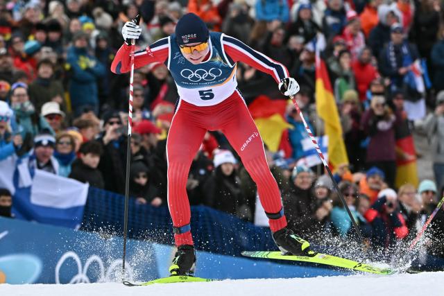 Norway's Jens Luraas Oftebro competes in the cross-country event of the nordic combined individual Gundersen large hill/10km at Tesero Cross Country Stadium at Lago di Tesero (Val di Fiemme) during the Milano Cortina 2026 Winter Olympic Games on February 17, 2026. (Photo by Javier SORIANO / AFP)