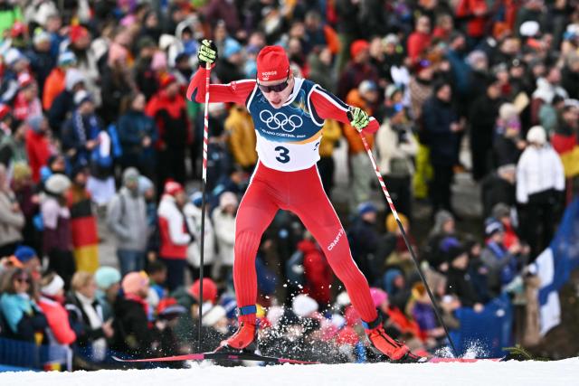 Norway's Andreas Skoglund competes in the cross-country event of the nordic combined individual Gundersen large hill/10km at Tesero Cross Country Stadium at Lago di Tesero (Val di Fiemme) during the Milano Cortina 2026 Winter Olympic Games on February 17, 2026. (Photo by Javier SORIANO / AFP)