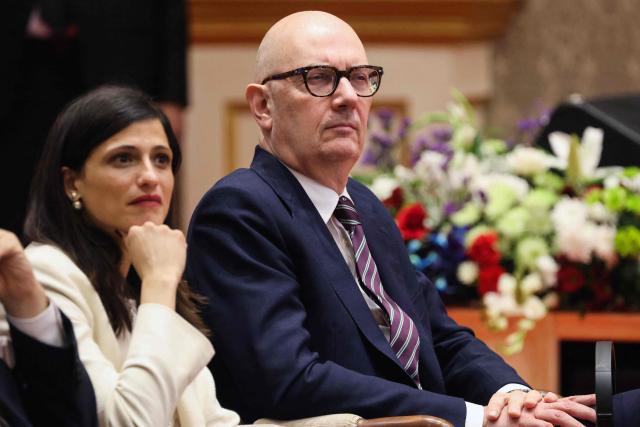 France's Economy and Finance Minister Roland Lescure (R) and junior Minister in charge of global Francophones and expatriates Eleonore Caroit attend the the virtual inauguration of the final assembly line (FAL) for Airbus H125 helicopters, a joint venture between India's Tata Group and Europe's Airbus, at a press event in Mumbai on February 17, 2026. (Photo by Ludovic MARIN / AFP)