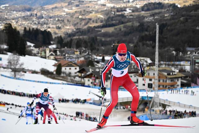 Norway's Andreas Skoglund competes in the cross-country event of the nordic combined individual Gundersen large hill/10km at Tesero Cross Country Stadium at Lago di Tesero (Val di Fiemme) during the Milano Cortina 2026 Winter Olympic Games on February 17, 2026. (Photo by Tobias SCHWARZ / AFP)