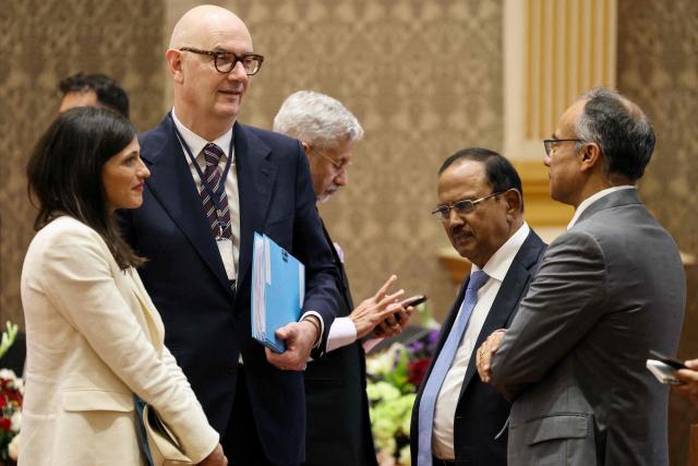 France's junior Minister in charge of global Francophones and expatriates Eleonore Caroit (L), Economy and Finance Minister Roland Lescure (2L) with India's Foreign Minister Subrahmanyam Jaishankar (C) and National Security Advisor Ajit Doval (2R) attend the virtual inauguration of the final assembly line (FAL) for Airbus H125 helicopters, a joint venture between India's Tata Group and Europe's Airbus, at a press event in Mumbai on February 17, 2026. (Photo by Ludovic MARIN / AFP)