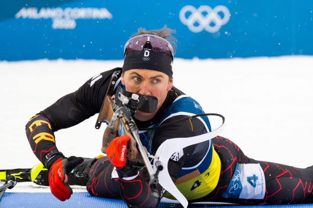 Germany's Philipp Nawrath prepares to shoot as he competes in the men's biathlon 4 x 7,5km relay event during the Milano Cortina 2026 Winter Olympic Games at the Anterselva Biathlon Arena (Sudtirol Arena) in Anterselva (Val Pusteria) on February 17, 2026. (Photo by FRANCOIS-XAVIER MARIT / AFP)