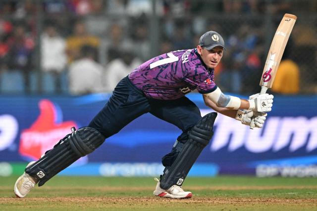 Scotland's Brandon McMullen plays a shot during the 2026 ICC Men's T20 Cricket World Cup group stage match between Nepal and Scotland at the Wankhede Stadium in Mumbai on February 17, 2026. (Photo by Punit PARANJPE / AFP)