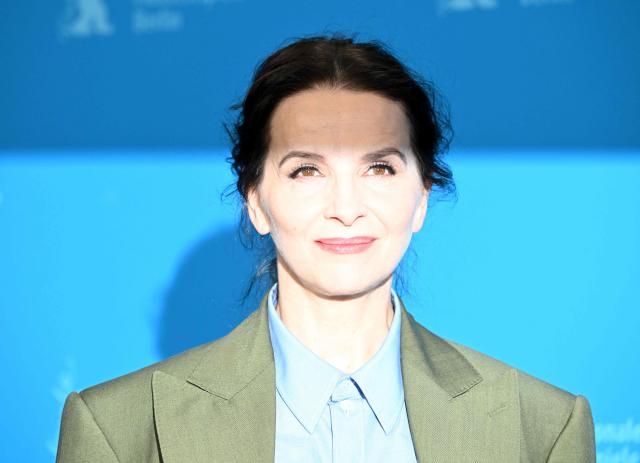 French actress Juliette Binoche poses during a photo call for the film "Queen at Sea" presented in competition at the 76th Berlinale, Europe's first major film festival of the year, in Berlin on February 17, 2026. (Photo by RALF HIRSCHBERGER / AFP)