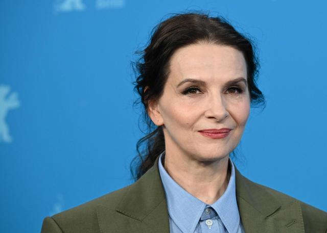 French actress Juliette Binoche poses during a photo call for the film "Queen at Sea" presented in competition at the 76th Berlinale, Europe's first major film festival of the year, in Berlin on February 17, 2026. (Photo by RALF HIRSCHBERGER / AFP)