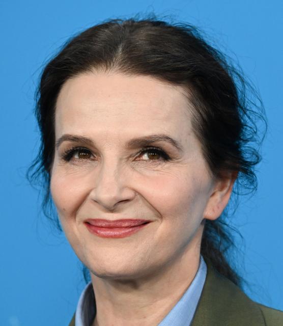 French actress Juliette Binoche poses during a photo call for the film "Queen at Sea" presented in competition at the 76th Berlinale, Europe's first major film festival of the year, in Berlin on February 17, 2026. (Photo by RALF HIRSCHBERGER / AFP)