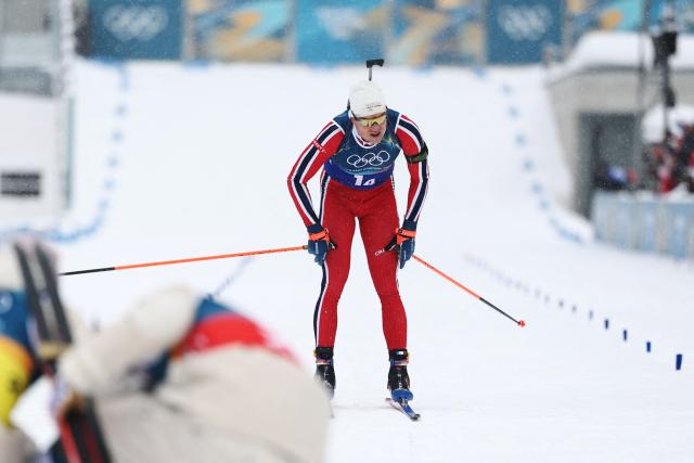 Norway's Vetle Sjaastad Christiansen reacts as he crosses the finish line in the men's biathlon 4 x 7,5km relay event during the Milano Cortina 2026 Winter Olympic Games at the Anterselva Biathlon Arena (Sudtirol Arena) in Anterselva (Val Pusteria) on February 17, 2026. (Photo by FRANCK FIFE / AFP)