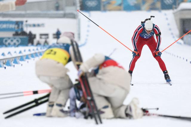 Norway's Vetle Sjaastad Christiansen reacts as he crosses the finish line in the men's biathlon 4 x 7,5km relay event during the Milano Cortina 2026 Winter Olympic Games at the Anterselva Biathlon Arena (Sudtirol Arena) in Anterselva (Val Pusteria) on February 17, 2026. (Photo by FRANCK FIFE / AFP)