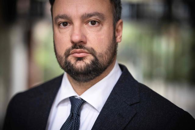 Pierre Debuisson, the new lawyer of Cedric Jubillar, who was convicted of murdering his wife Delphine at first instance, poses during a photo session in Toulouse on February 17, 2026. Cedric Jubillar, convicted of murdering his wife, is being subjected to a ‘form of modern torture’ while imprisoned in solitary confinement, his new lawyer said. The Toulouse Court of Appeal pointed out that any placement in solitary confinement ‘falls under the jurisdiction of the Minister of Justice’. (Photo by Lionel BONAVENTURE / AFP)