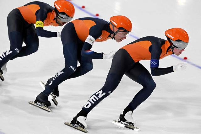 (From L) Netherlands' Chris Huizinga, Netherlands' Jorrit Bergsma and Netherlands' Stijn van de Bunt compete in the speed skating men's team pursuit final B during the Milano Cortina 2026 Winter Olympic Games at Milano Speed Skating Stadium in Milan on February 17, 2026. (Photo by Daniel MUNOZ / AFP)