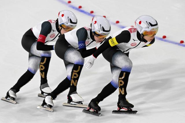 (From L) Japan's Ayano Sato, Japan's Hana Noake and Japan's Miho Takagi compete in the speed skating women's team pursuit final B during the Milano Cortina 2026 Winter Olympic Games at Milano Speed Skating Stadium in Milan on February 17, 2026. (Photo by Daniel MUNOZ / AFP)