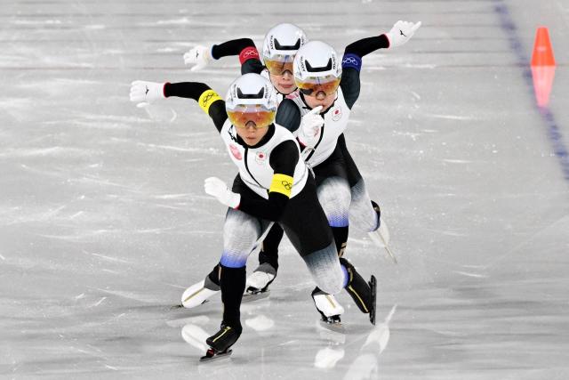 (From back) Japan's Ayano Sato, Japan's Hana Noake and Japan's Miho Takagi compete in the speed skating women's team pursuit final B during the Milano Cortina 2026 Winter Olympic Games at Milano Speed Skating Stadium in Milan on February 17, 2026. (Photo by Daniel MUNOZ / AFP)