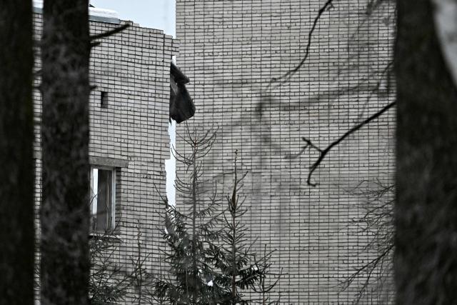 A view of the site of the collapsed military police building on the grounds of an army base in Sertolovo in the Leningrad region on February 17, 2026. Local media reported that three people died in the incident, citing emergency services. (Photo by Olga MALTSEVA / AFP)