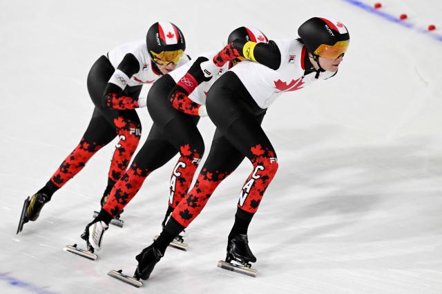 (From L) Canada's Ivanie Blondin, Canada's Valerie Maltais and Canada's Isabelle Weidemann compete in the speed skating women's team pursuit final during the Milano Cortina 2026 Winter Olympic Games at Milano Speed Skating Stadium in Milan on February 17, 2026. (Photo by Daniel MUNOZ / AFP)