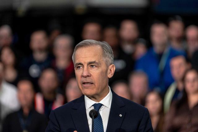 Canadian Prime Minister Mark Carney makes an announcement on new measures to strengthen security, create prosperity, and reinforce strategic autonomy at Canadian Aviation Electronics (CAE), a flight simulation company, in Montreal, Quebec, Canada, on February 17, 2026. (Photo by ANDREJ IVANOV / AFP)