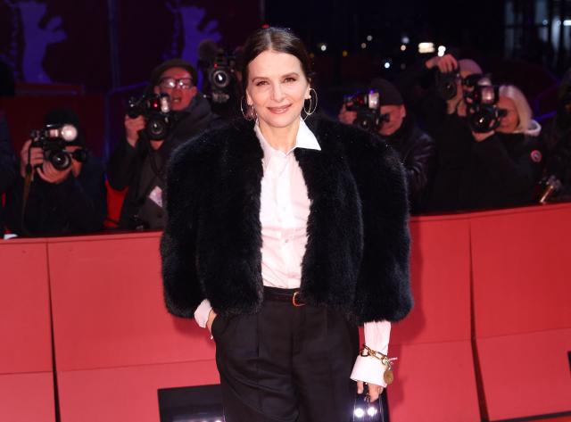 French actress Juliette Binoche poses on the red carpet for the film "Queen at Sea" presented in competition at the 76th Berlinale, Europe's first major film festival of the year, in Berlin on February 17, 2026. (Photo by Ronny HARTMANN / AFP)
